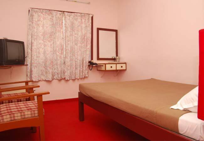 Hotel Gps Kodaikanal Pokoj fotografie